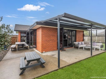 Stylish, Sleek, Triple car garage and Brick!
