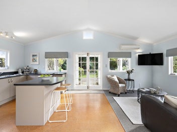Beach Side Flexibility & Income Potential!