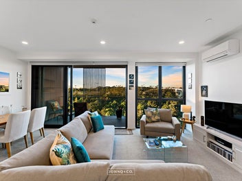 Top-Floor Living with Exceptional Amenities