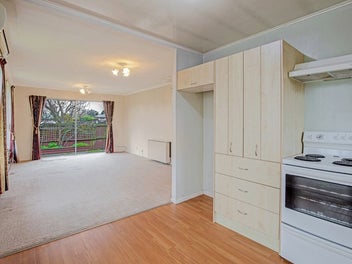 Invest or Nest 2-Bedroom Unit with Potential
