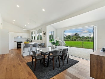 Big, bold, nearly brand-new home and income