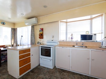 Four bedroom home with development potential!