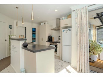 BUILT TO ENJOY, SUN-FILLED EASY LIVING!