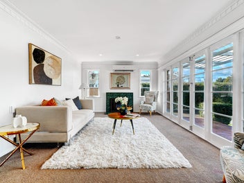 REFRESHED BRICK HOME WITH ENCLOSED BACKYARD!