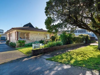Starter-Solid Brick Home in a Prized Location