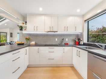 Private family haven with exceptional garage space
