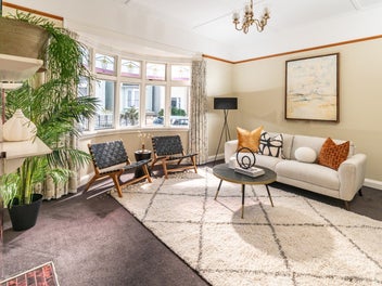 FLEXIBLE FAMILY HOME AND INCOME BEO $1,395,000
