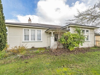 Three Large Sheds/Carports and a House!