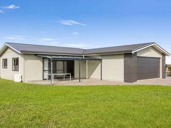 Modern Coastal Living on a Sunny Corner Section