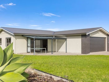 Modern Coastal Living on a Sunny Corner Section