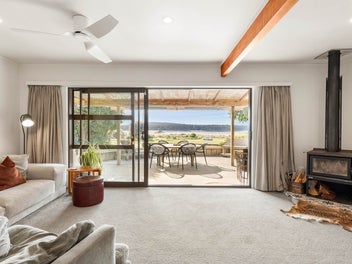 Funky Riverfront Gem with Plenty to Offer