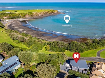 OCEAN VIEWS MODERN RETREAT WITH TRIPLE GARAGING