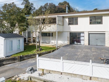 Sunny Three-Bedroom Home With Bonus Studio Unit