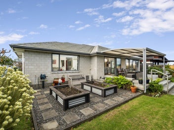 Elevated Family Haven with Superb Outdoor Living