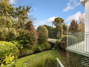 Streamside living in desirable Saint Albans.
