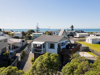 Classic Beach Bach with Views – Under $799,000!