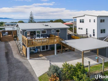 Elevated Gem - Sea, Sun & Income Potential
