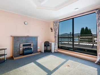 Rough Diamond in prime waterfront location.