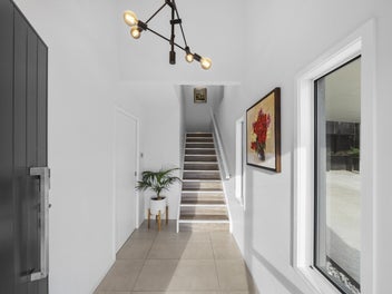 Stylish family living with poolside entertaining