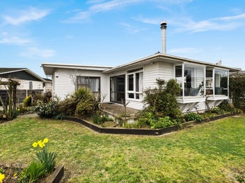 Four-Bedroom Gem on Flaxmere Avenue!