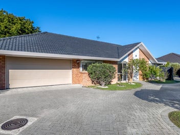 Low-Maintenance Luxury: Renovated Brick & Tile