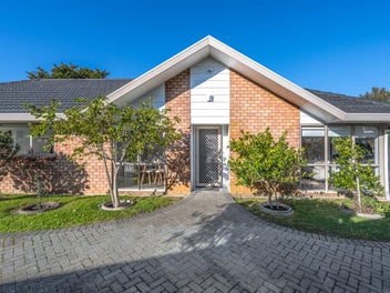 Low-Maintenance Luxury: Renovated Brick & Tile