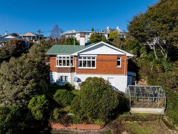 Sunny brick charmer with views and location