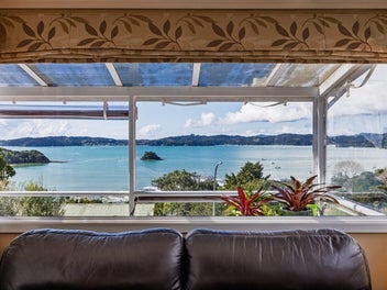 TOP OF THE BAY! HOME & INCOME – HUGE PRICE DROP!