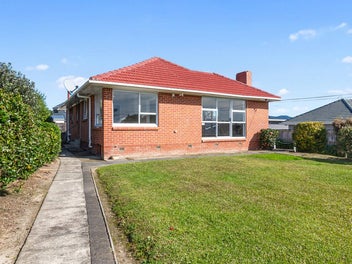 Charming Three Bedroom Brick and Tile Home