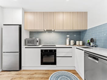 Modern Affordable, End Unit Opportunity.