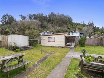 Solid brick home with self contained sleepout