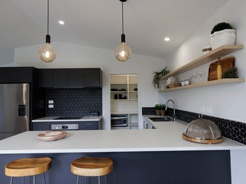 Home and Income in Ravenswood! 100% Fixed price