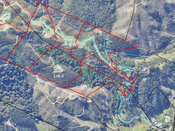 Large flat build pad, views, native bush and creek
