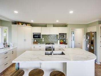 Elevated home and income with views