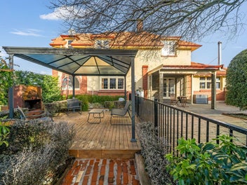 "Five Bedrooms, Four Cars- Rare Find"