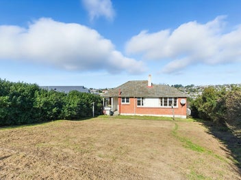 A Solid Brick Beauty with Elevated Potential