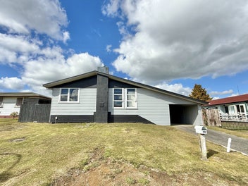 Sunny deck, big backyard and double garage
