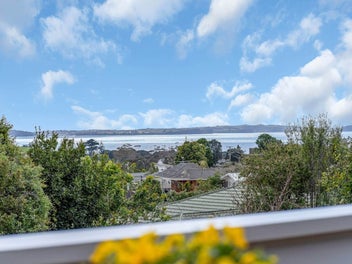 Exceptional Sea Views, Two Garages & Ample Parking