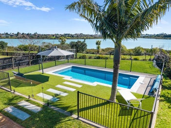 Dive into this Sensational Waterfront Oasis!