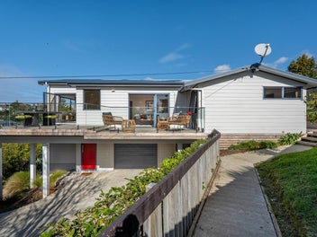 SOLD - Red Beach family living