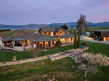Elevated view home with super large shed
