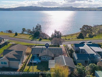 Exclusive Three Mile waterfront