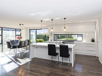 Live Large with a Triple Car Garage!