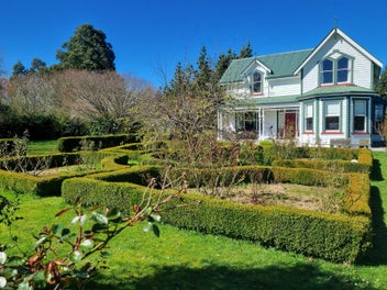 Charming Victorian Style Home and Quality Land