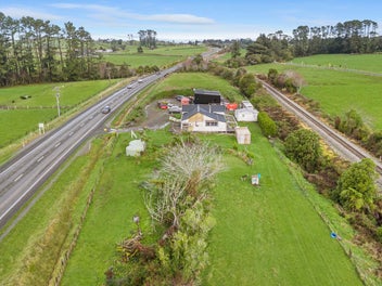 almost 4acres plus 4 bedroom and 4 car garage