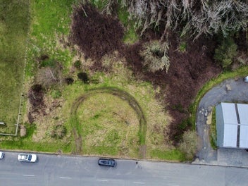 2 titles industrial zoned bare land