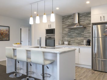 Private, sunny, low-maintenance living