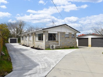 Brick Freehold Unit - Great Home or Investment