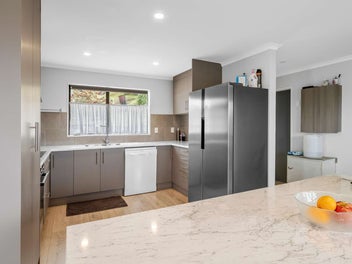 Modern convenience with garaging!