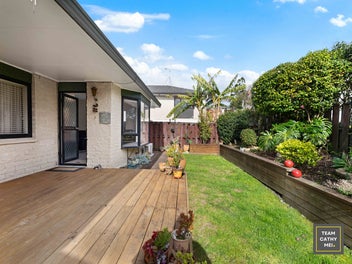 Brick Beauty With Garden and Deck to Match!